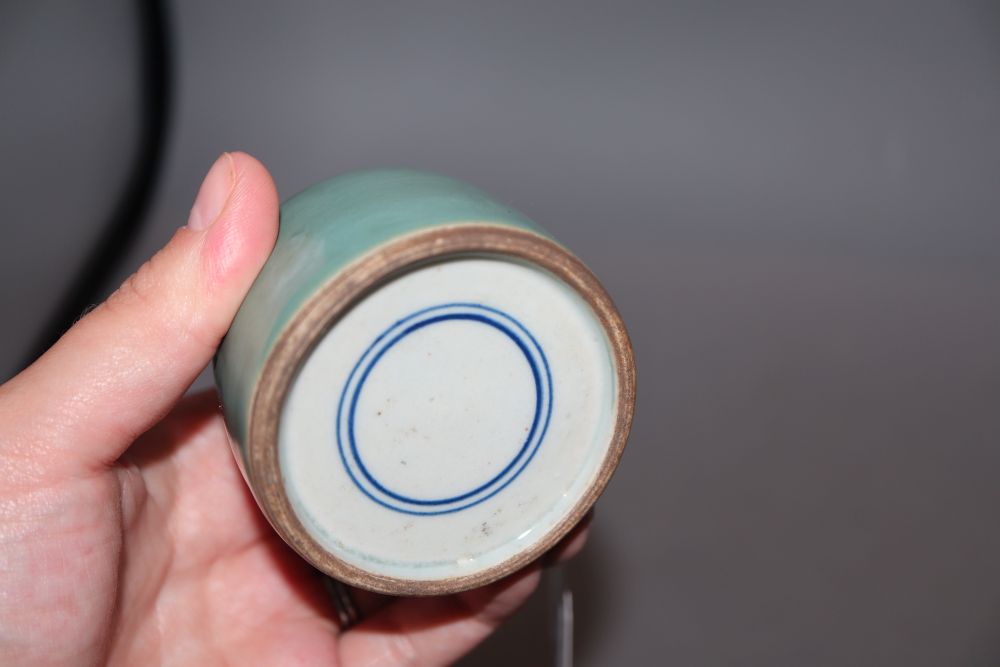 A Chinese green glazed water pot and a flambe brushwasher, diameter 12cm